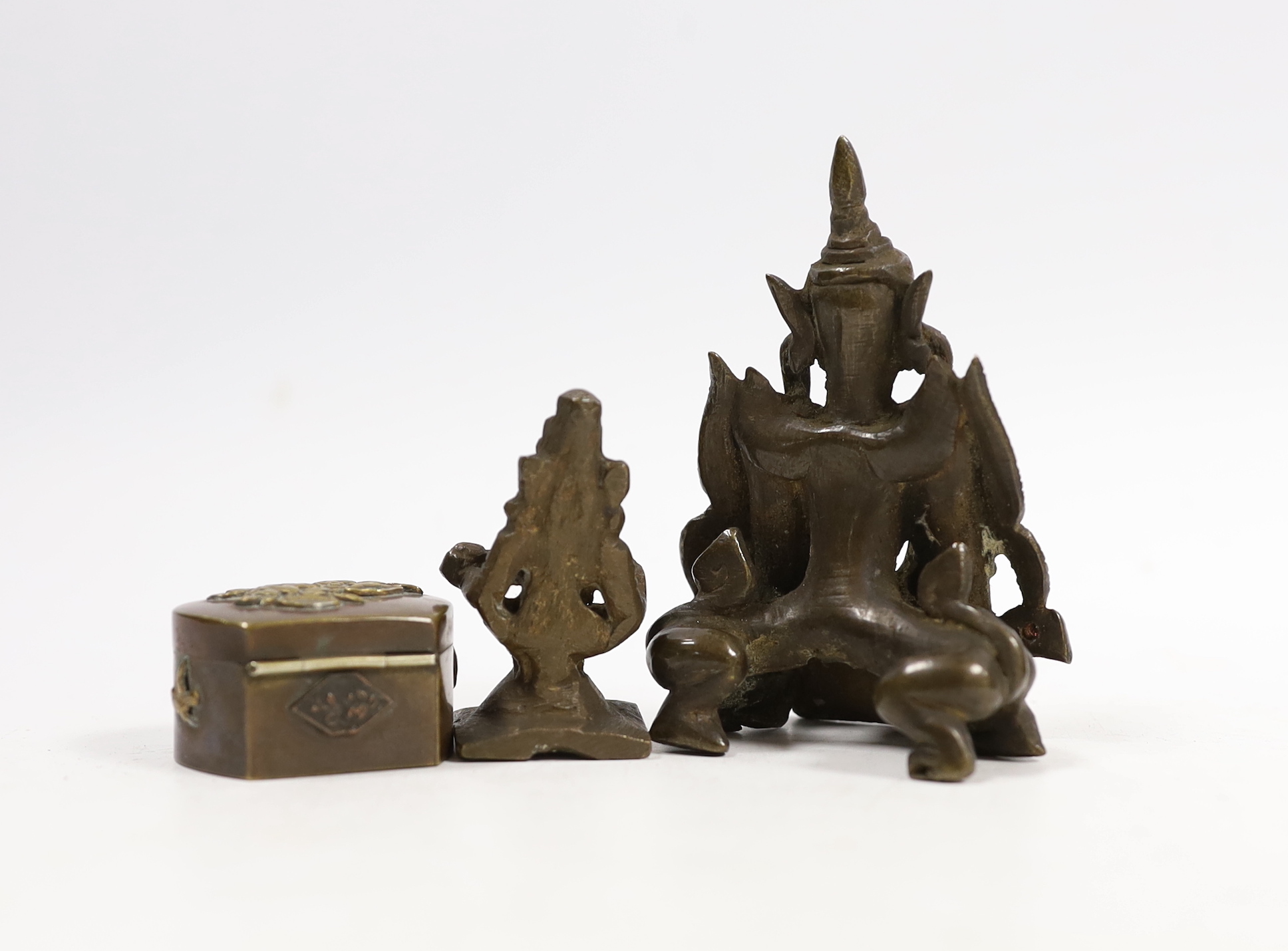 A Japanese mixed metal Vesta case modelled as an oni, a similar box, a Thai bronze figure and an Indian brass figure (4)